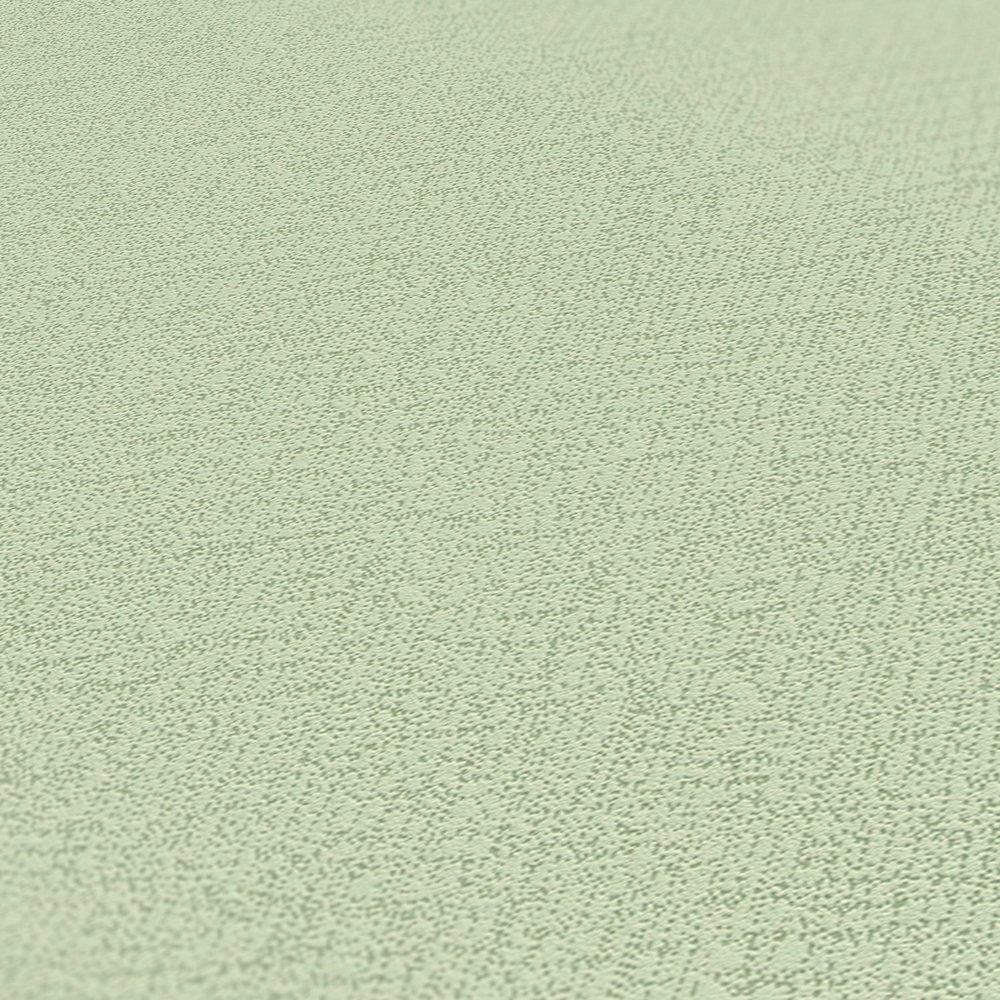 Zaļas tapetes ar lina faktūru dabīgiem un harmoniskiem sienu risinājumiem