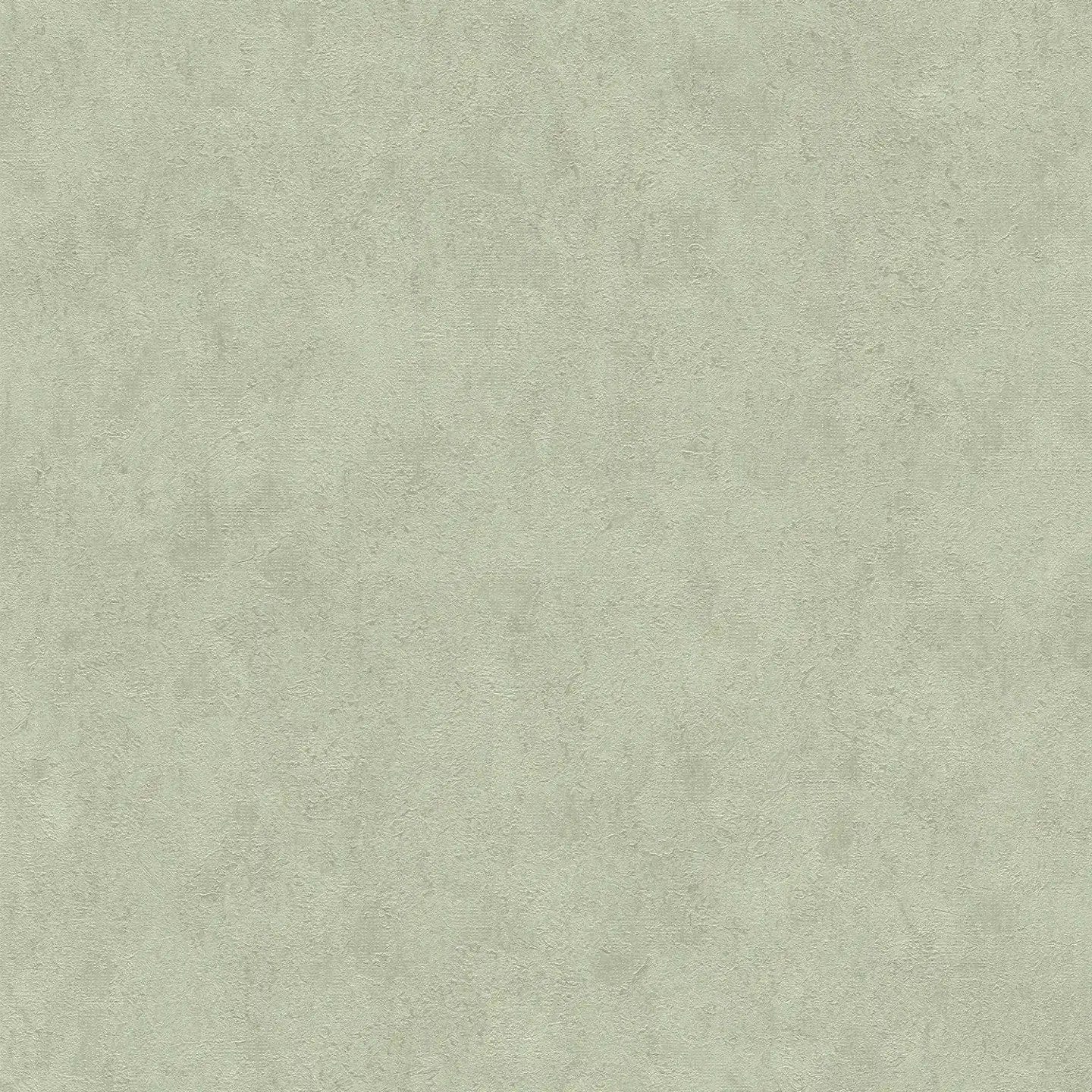 Zaļas tapetes ar viegli spīdīgu faktūru un dabisku noskaņu - viesistabas interjerā