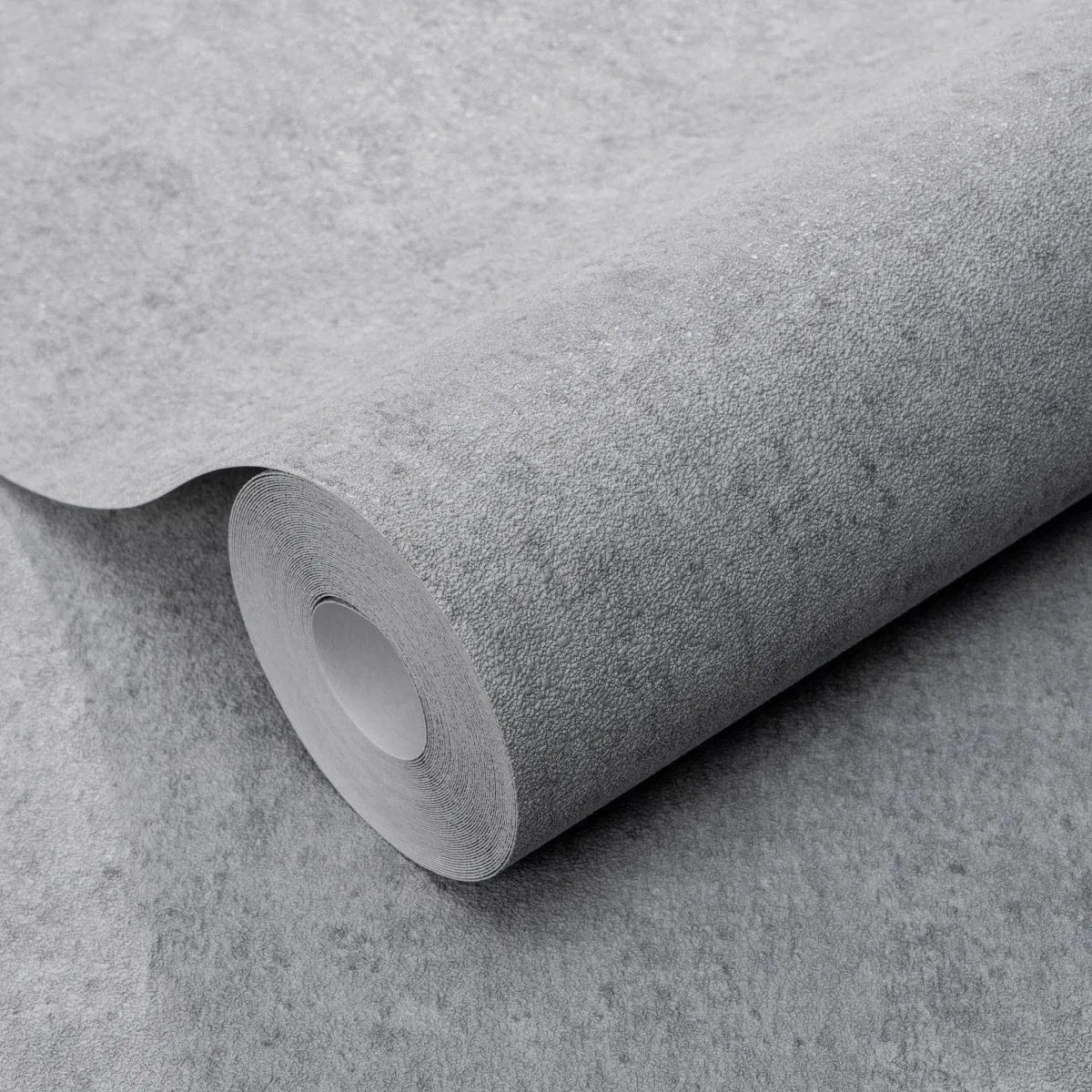 Pelēkas tapetes ar apmetuma efektu un matētu virsmu – Erismann interjera risinājums  