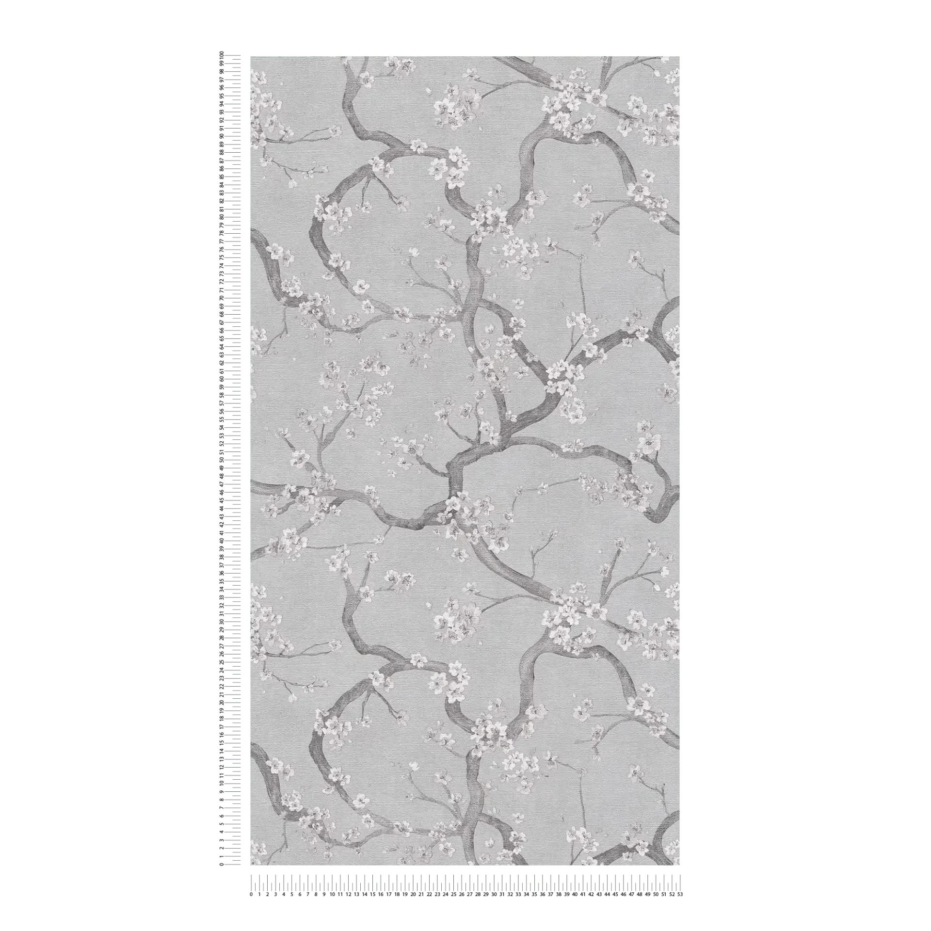 Pelēkas un rozā tapetes ar teksturētu virsmu un ķiršu ziediem - guļamistabas interjerā