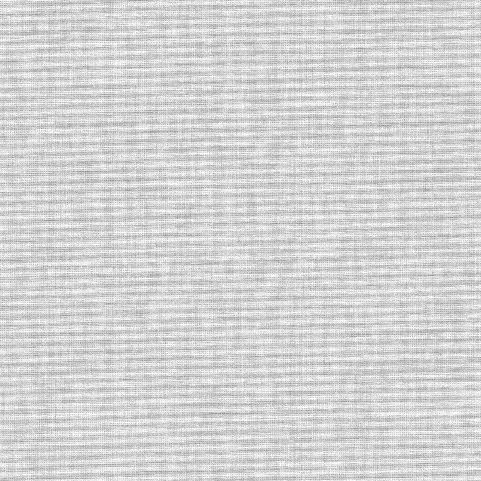 Pelēkas flizelīna tapetes ar lina virsmas efektu - guļamistabas interjerā