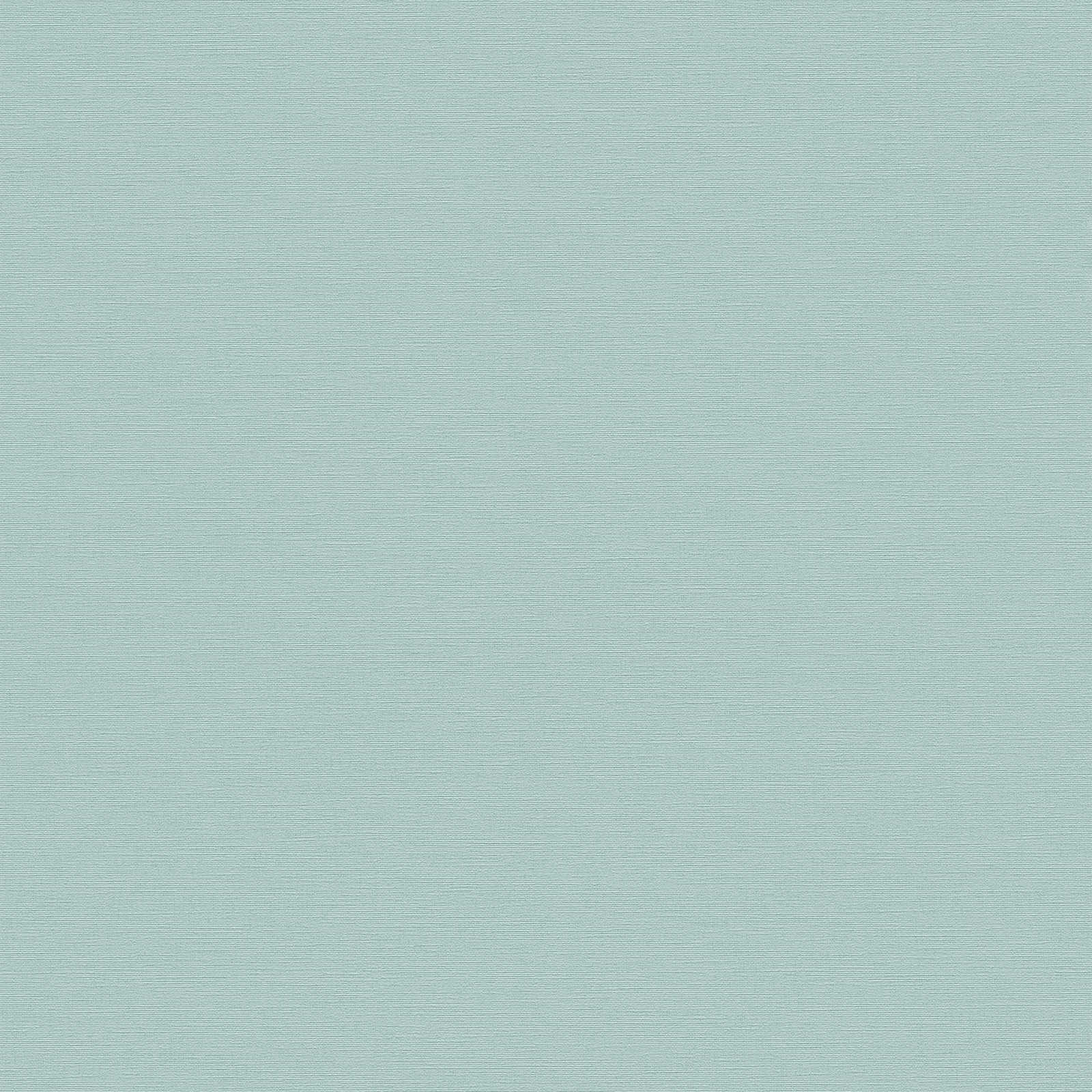 Tirkīza tapetes ar vienkrāsainu lina rakstu - guļamistabas interjerā